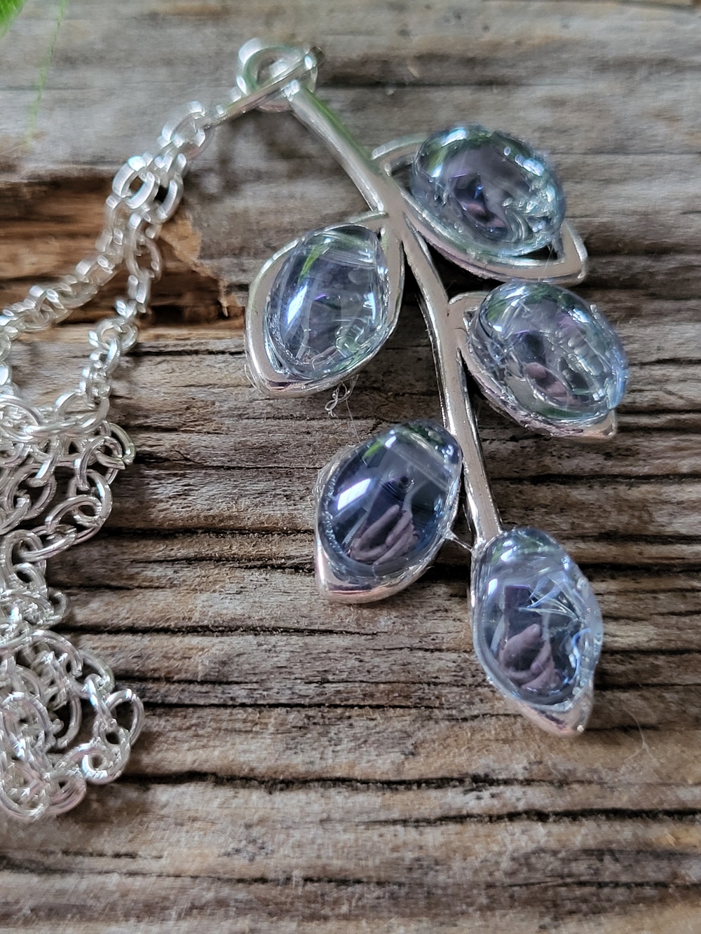 Silver Leaf Pendant Necklace with Light Blue Crystal